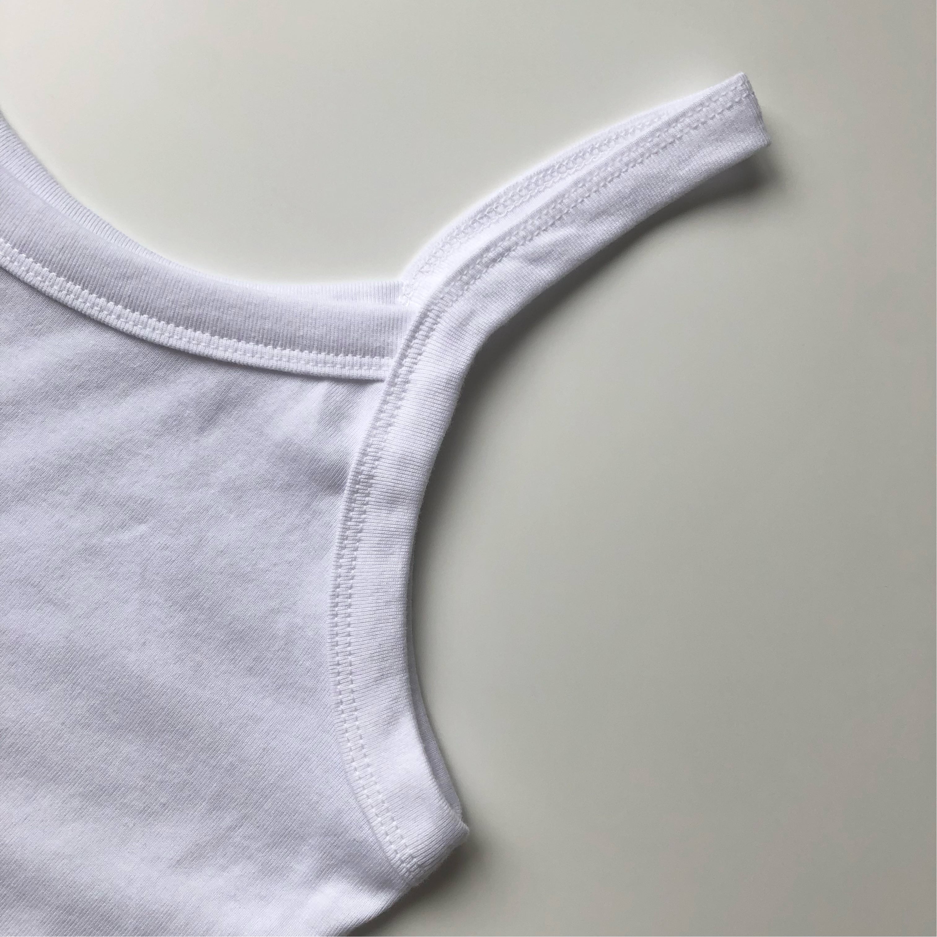 Light and Soft Stretch Premium Blend White Spaghetti Strap Seam