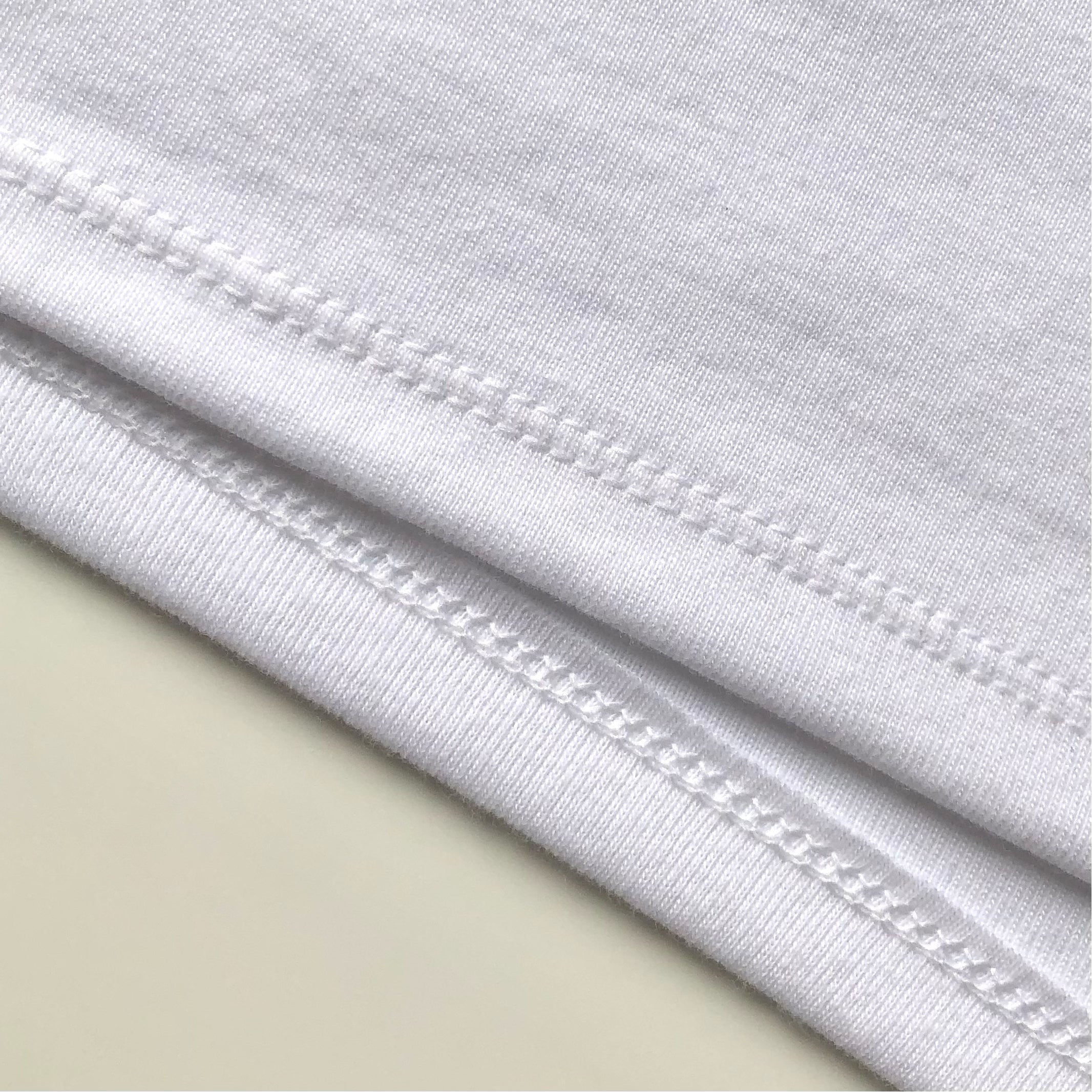 Light and Soft Stretch Premium Blend White Spaghetti Strap Top Bottom Hem