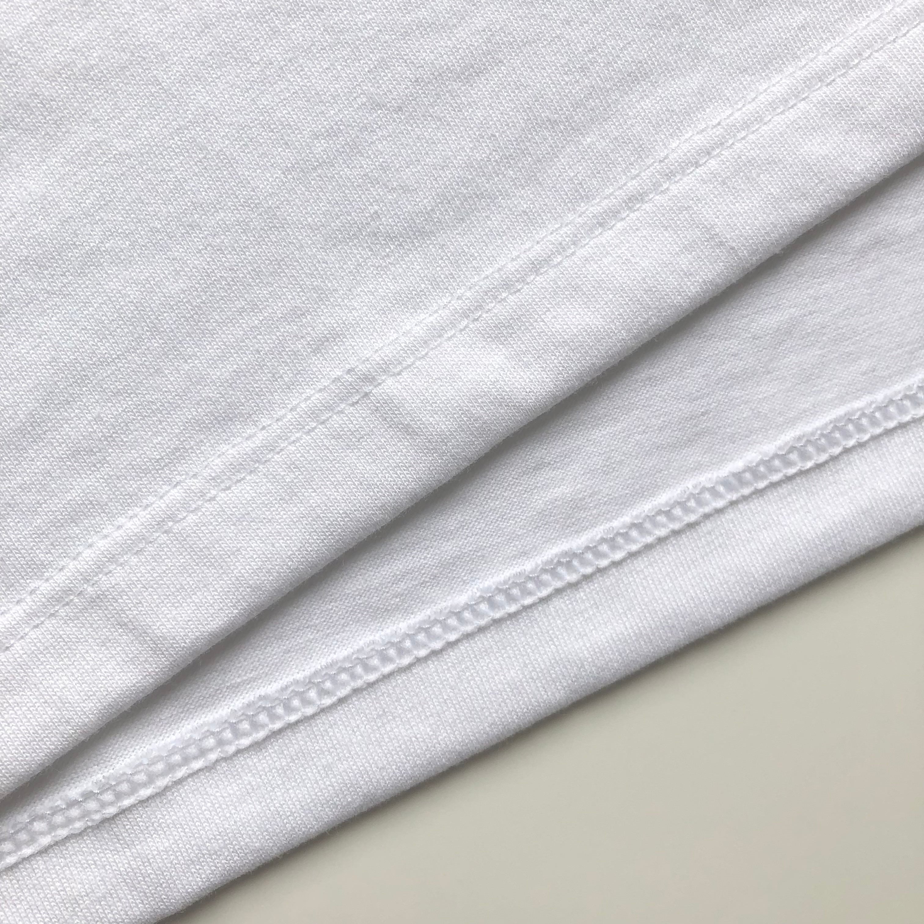 Super Soft Relaxed Lightweight Premium Blend White T-shirt Bottom Hem