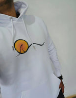 Man wearing white hoodie with line wave and sun graphic.